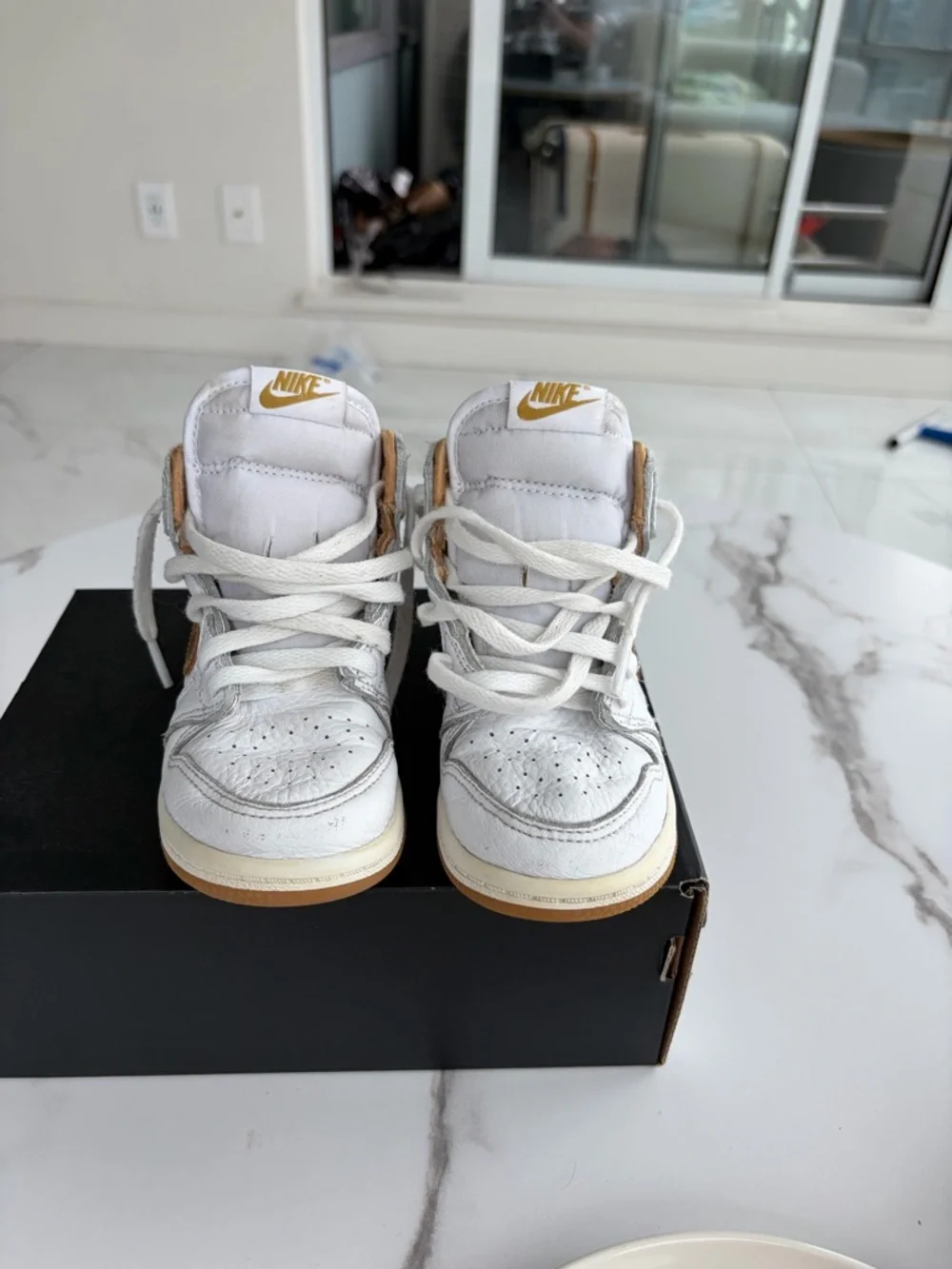 Nike Kids White and Tan High-Top Sneakers with Gold Logo Accent - Picture 1 of 5